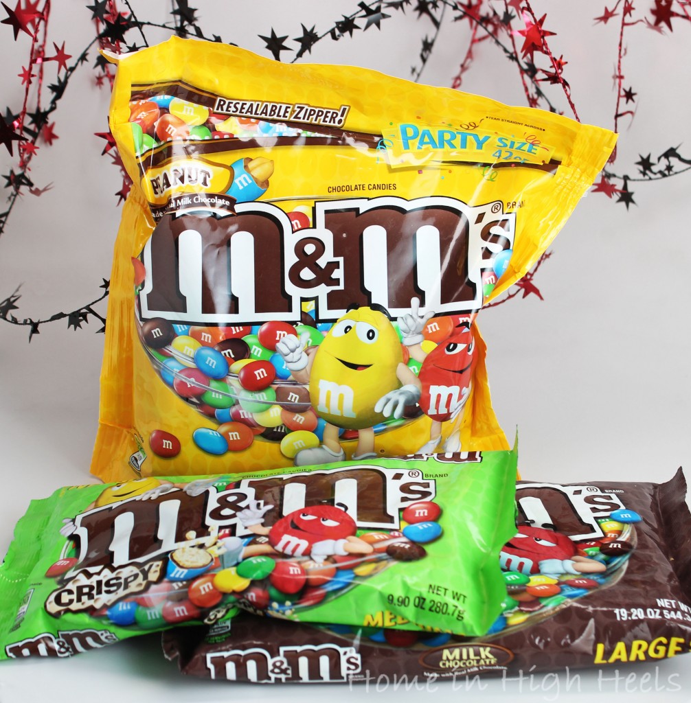 This White Chocolate M&M Popcorn Recipe is the Perfect Mix for Parties! Get party ready FAST with this kid-friendly adult-pleasing snack mix that you can really customize! from Home in High Heels