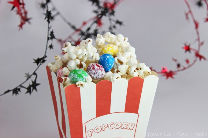 This White Chocolate M&M Popcorn Recipe is the Perfect Mix for Parties! Get party ready FAST with this kid-friendly adult-pleasing snack mix that you can really customize! from Home in High Heels