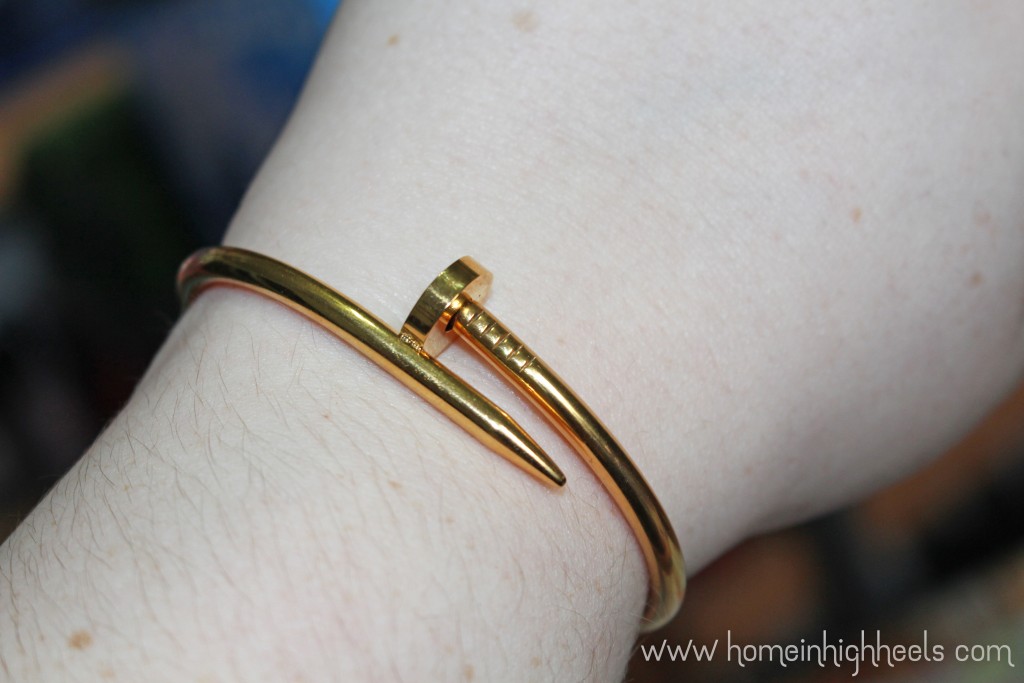 Add Some Construction to Your Look With this Nail Bracelet! This is a fun industrial touch that adds some glam without being the high price of Cartier. Check it out along with other lifestyle posts on Home in High Heels | www.homeinhighheels.com