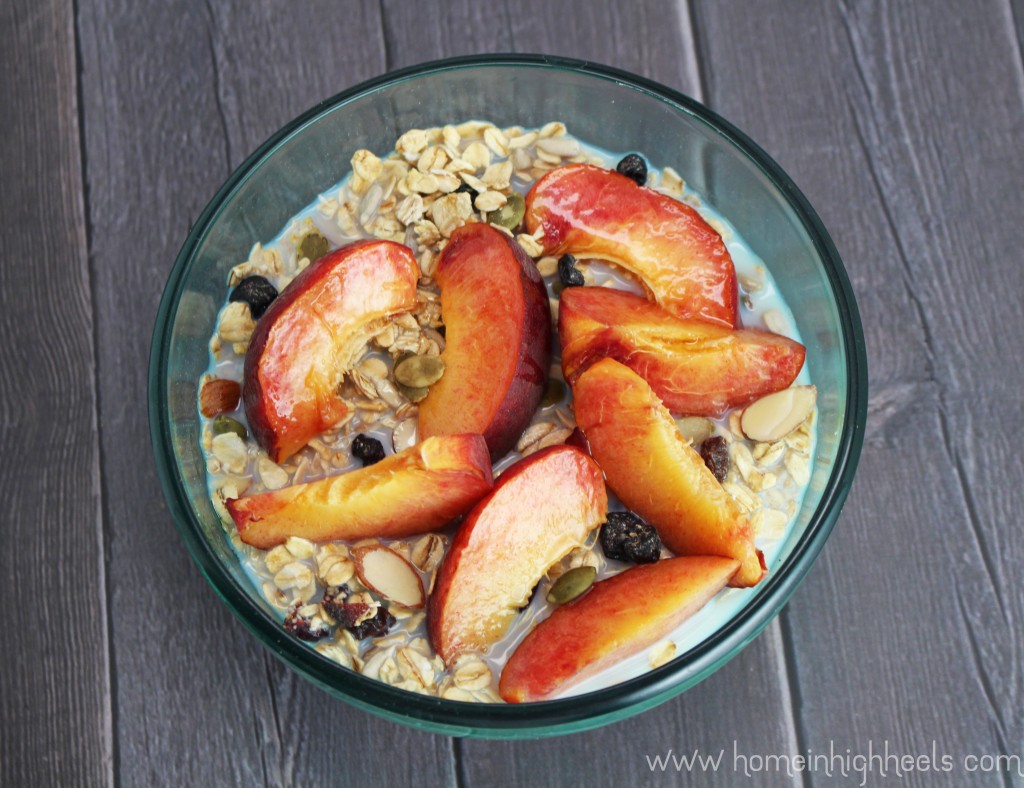 A delicious Muesli Breakfast Bowl with Peaches & Maple  using the Nature Valley Toasted Oats Muesli which has rolled oats, fruit, nuts, & seeds. This healthy recipe is easy to customize, makes breakfast & brunches fun, & tastes wonderful! Check it out on Home in High Heels | www.homeinhighheels.com