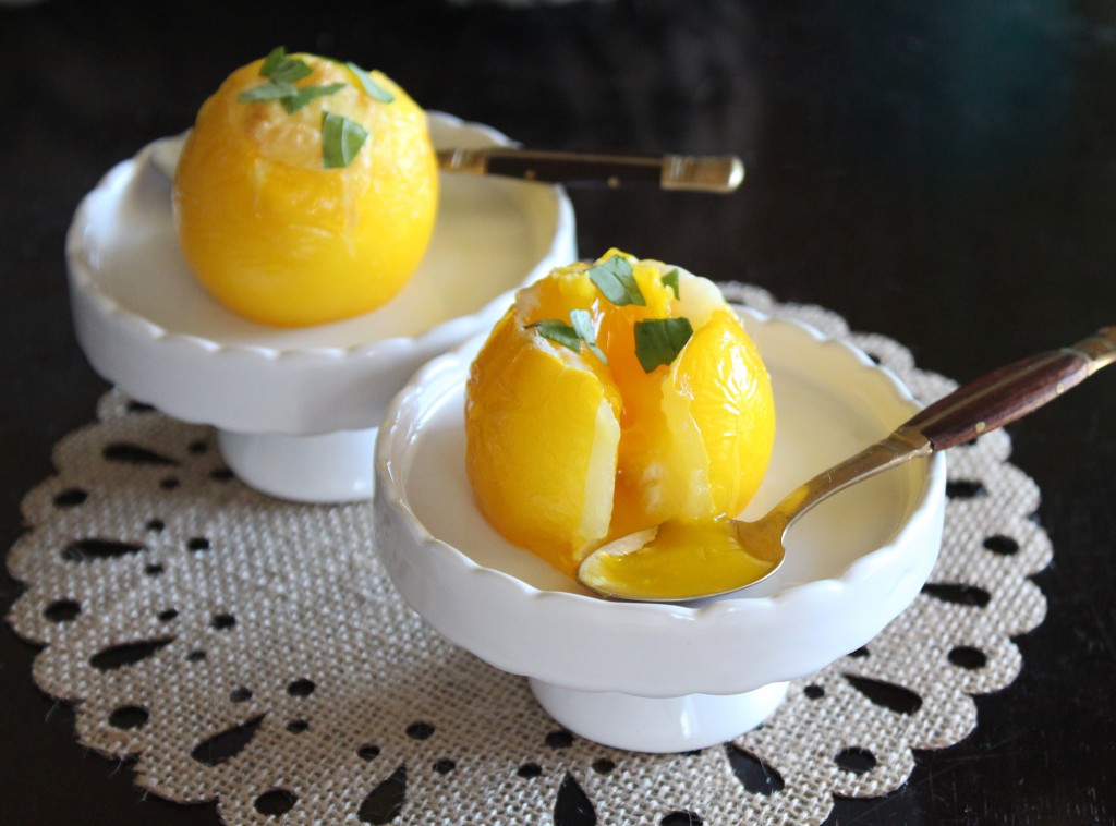 An effortless healthy breakfast or brunch with Eggs Baked in Tomatoes- this recipe is simple to throw together, low calorie, high protein, & low carb! Check it out on Home in High Heels | www.homeinhighheels.com