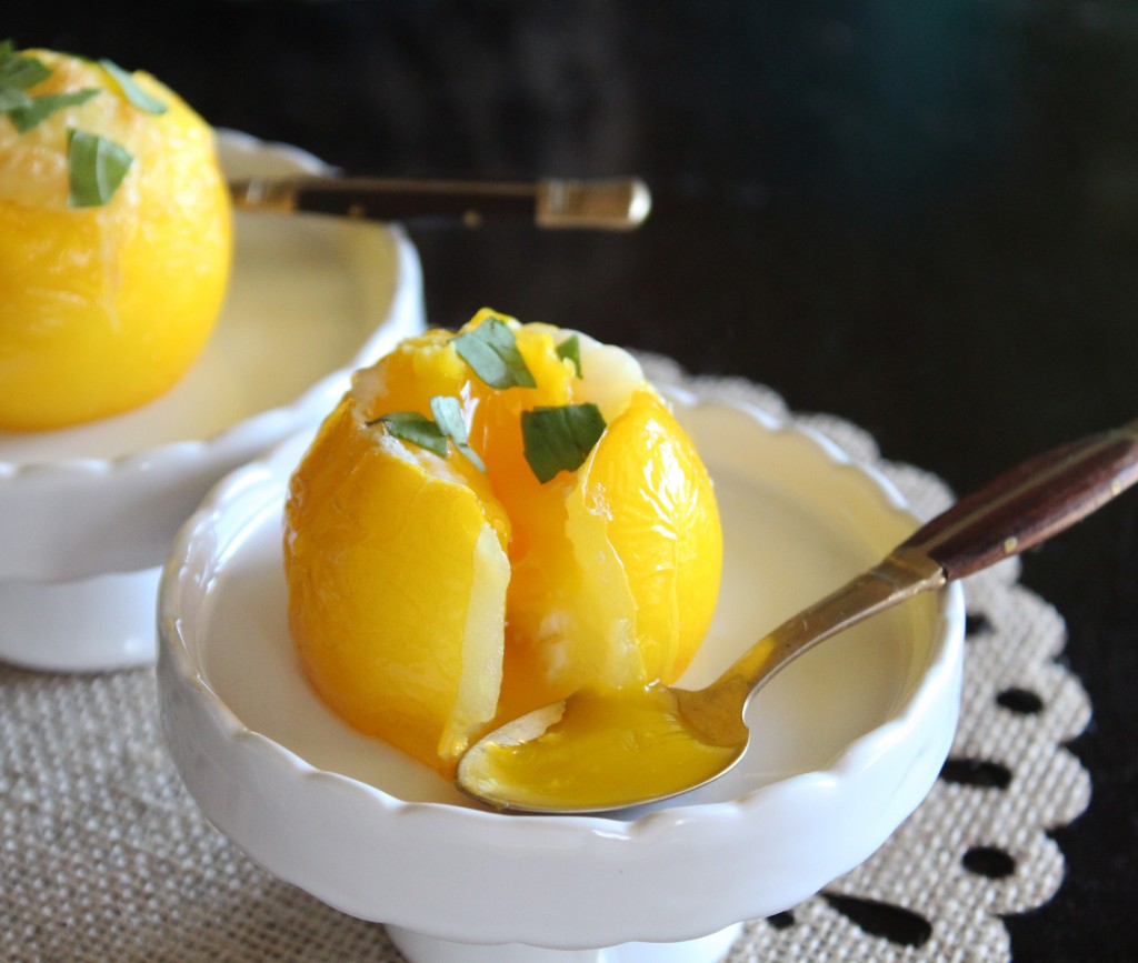 An effortless healthy breakfast or brunch with Eggs Baked in Tomatoes- this recipe is simple to throw together, low calorie, high protein, & low carb! Check it out on Home in High Heels | www.homeinhighheels.com