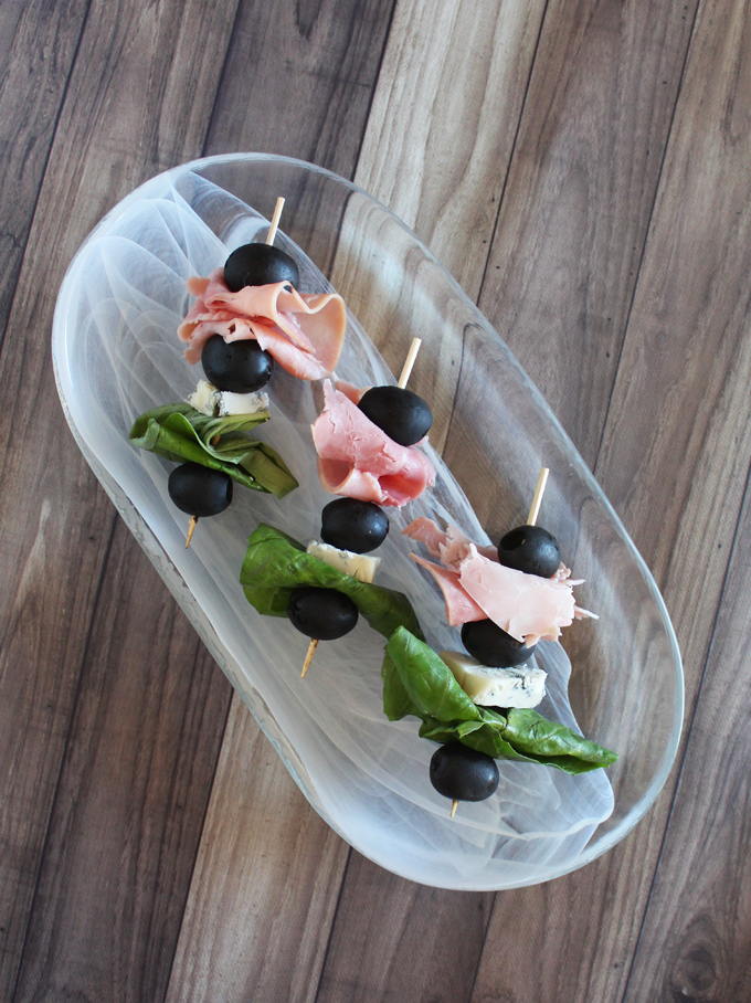 The Anti-Salad Healthy Appetizer Skewers Recipe- this one includes gorgonzola, ham, black olives, & basil but there are lots of ways to customize! Check out more ideas on Home in High Heels
