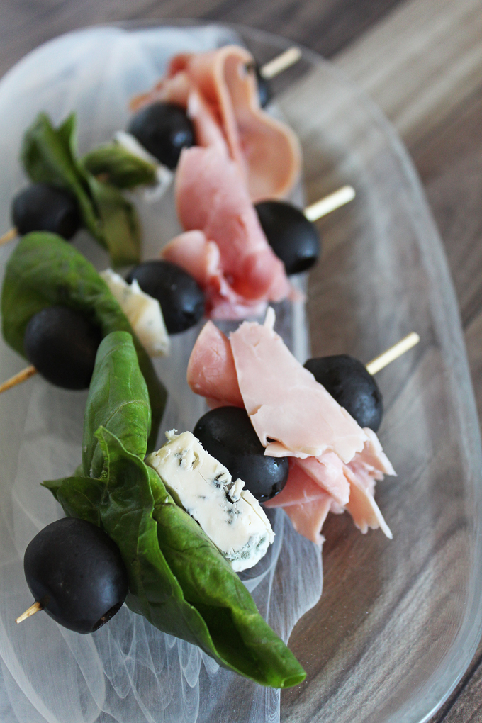 The Anti-Salad Healthy Appetizer Skewers Recipe- this one includes gorgonzola, ham, black olives, & basil but there are lots of ways to customize! Check out more ideas on Home in High Heels
