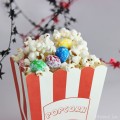 This White Chocolate M&M Popcorn Recipe is the Perfect Mix for Parties! Get party ready FAST with this kid-friendly adult-pleasing snack mix that you can really customize! from Home in High Heels