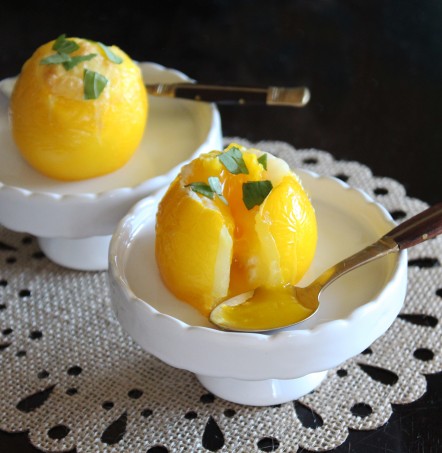 An effortless healthy breakfast or brunch with Eggs Baked in Tomatoes- this recipe is simple to throw together, low calorie, high protein, & low carb! Check it out on Home in High Heels | www.homeinhighheels.com