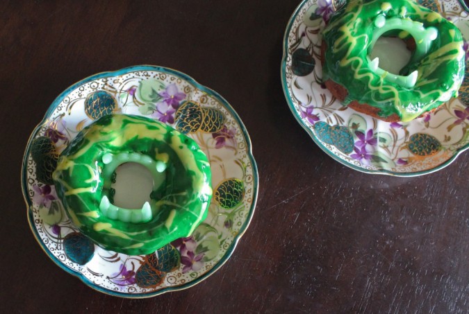 Check out this simple & quick recipe for biscuit donuts you can make at home- & learn how to make your very own Fanged Green Monster Quick Donuts -Spooky & Fun! Check out more lifestyle, food, & fun posts on Home in High Heels