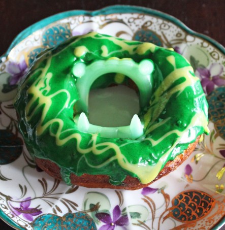 Check out this simple & quick recipe for biscuit donuts you can make at home- & learn how to make your very own Fanged Green Monster Quick Donuts -Spooky & Fun! Check out more lifestyle, food, & fun posts on Home in High Heels