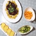 This family meal includes a roasted chicken, sour cream & onion potatoes, buffalo cauliflower, ranch broccoli, & some garlic cheese toast. Prep it & have it on the table in under 20 minutes easy! Check out tips & tricks as well was recipes, home, & lifestyle posts on Home in High Heels!