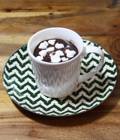 A simple recipe for the BEST slowcooker hot chocolate- a crockpot recipe perfect for a party! & a DIY tutorial for those cute over-the-mug cutout cookies too! I went with stars- but most shapes will work! Read more about lifestyle, food, & style on Home in High Heels