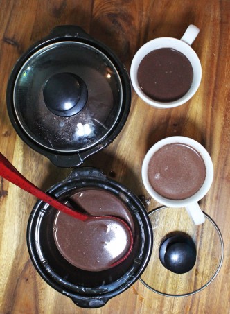 A simple recipe for the BEST slowcooker hot chocolate- a crockpot recipe perfect for a party! & a DIY tutorial for those cute over-the-mug cutout cookies too! I went with stars- but most shapes will work! Read more about lifestyle, food, & style on Home in High Heels
