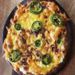 This recipe for Bacon Jalapeno Popper Pita Pizzas is perfect as a single-serving, kid friendly idea, & even works as an appetizer! Never complain about not having time to make dough again! View more recipes & lifestyle posts on Home in High Heels