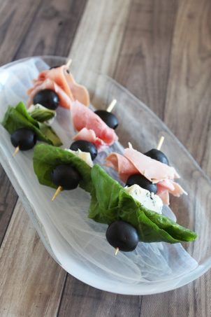 The Anti-Salad Healthy Appetizer Skewers Recipe- this one includes gorgonzola, ham, black olives, & basil but there are lots of ways to customize! Check out more ideas on Home in High Heels