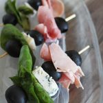 The Anti-Salad Healthy Appetizer Skewers Recipe- this one includes gorgonzola, ham, black olives, & basil but there are lots of ways to customize! Check out more ideas on Home in High Heels