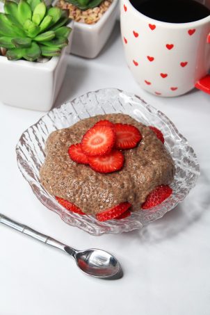 Chocolate Chia Pudding with Strawberries- a gluten free, dairy free, keto, low carb, high fiber recipe! See more lifestyle, recipes, & fun on Home in High Heels