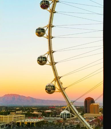 The High Roller Ferris Wheel at the Linq on the Las Vegas Strip in Nevada at Sunset My top 5 reasons Las Vegas has become home + local spots to visit! Why Do You Like Living in Las Vegas So Much? on Home in High Heels