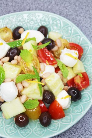 Summer salad recipe packed with protein! Vegetarian, easily vegan, & fresh! Perfect for BBQ or picnics on a budget to feed a crowd on Home in High Heels