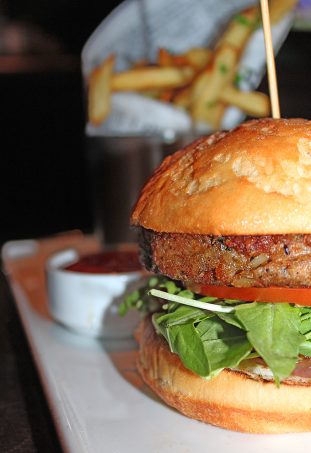 Southwest Burger, a soy patty with chipotle vegan mayo, grilled onion, japapeno, guacamole and served with truffle fries In Downtown Las Vegas, see the Glegan Menu (Gluten-Free & Vegan) at Triple George Grill with a bonus pescetarian option on Home in High Heels