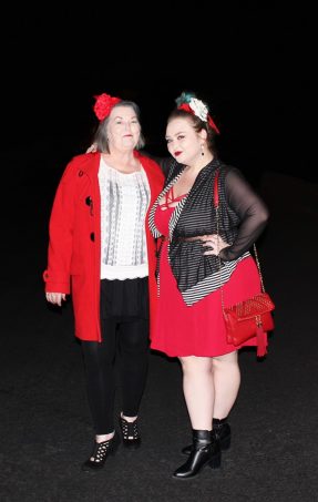 Strappy red dress with red bralette, Bacino Design striped black & white cardigan sweater, chunky studded boots, & read leather studded bag curvy OOTD Black, White, Red, & French! Oh La La Bistro Restaurant Recap in Las Vegas with Christmas in Paris Little Red Dress Curvy OOTD on Home in High Heels