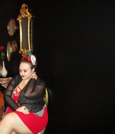 Strappy red dress with red bralette, Bacino Design striped black & white cardigan sweater, chunky studded boots, & read leather studded bag curvy OOTD Black, White, Red, & French! Oh La La Bistro Restaurant Recap in Las Vegas with Christmas in Paris Little Red Dress Curvy OOTD on Home in High Heels