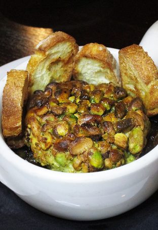 WARM CRUSTED PISTACHIO GOAT CHEESE with Onions confit jam, pistachio, honey and crostini. Black, White, Red, & French! Oh La La Bistro Restaurant Recap in Las Vegas with Christmas in Paris Little Red Dress Curvy OOTD on Home in High Heels