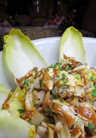 L'ENDIVE Belgium endive with french blue cheese, candied walnuts and vinaigrette. Black, White, Red, & French! Oh La La Bistro Restaurant Recap in Las Vegas with Christmas in Paris Little Red Dress Curvy OOTD on Home in High Heels