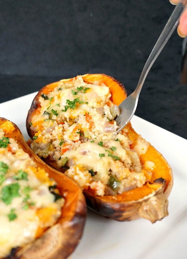 Healthy Vegetarian Stuffed Butternut Squash with Couscous & Vegetables  10 Delicious Butternut Recipes to Ring in Autumn! Options like gluten-free, vegan, & low carb too in order to fully enjoy this fall squash on Home in High Heels